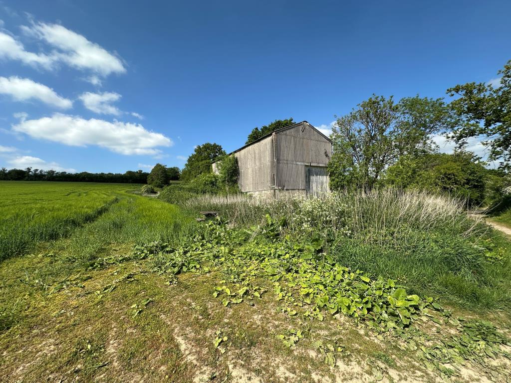 Lot: 80 - HALF AN ACRE OF FREEHOLD LAND WITH RETIRED BARN - External of retired commercial barn